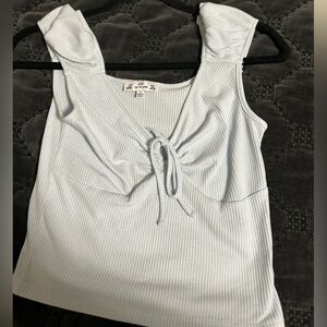 Baby blue blouse in new condition hasn’t been used perfect condition